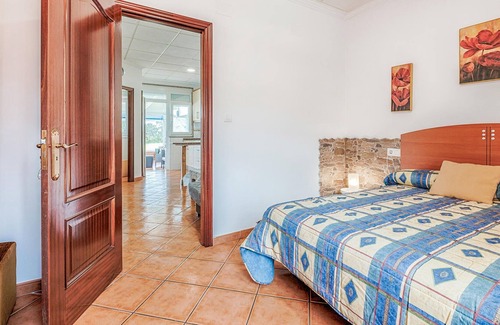 Merexo Apartment | Step into a practically equipped vacation apartment, close to picturesque stretches of coastline and