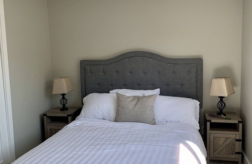 Courtenay House | Steps away from the beach with endless views