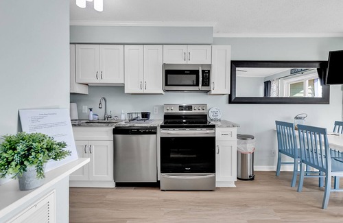 Garden City Condo | Steps from the beach! Summer Wind by the Sea- Ocean Views and Pool!