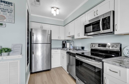 Garden City Condo | Steps from the beach! Summer Wind by the Sea- Ocean Views and Pool!