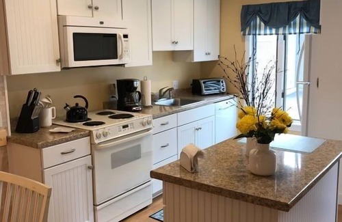 Hyannis Condo | Steps to private beach & heated pool, 1-mile from Main St. shops, AC, & Wi-Fi