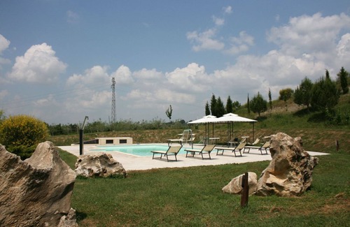 Rapolano Terme Villa | Stone villa built in an old furnace and completely restored, with private swimming pool and garden.