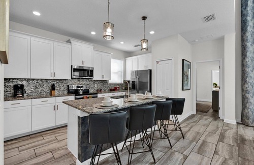 Kissimmee House | Storey Lake Resort 5 Bedroom Pool Home with Themed Rooms