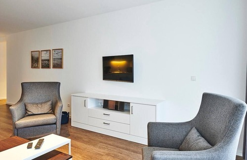 Bensersiel Apartment | Strandnahes, Modernes Apartment mit Westbalkon Inkl. Schwimmbad- & Saunanutzung