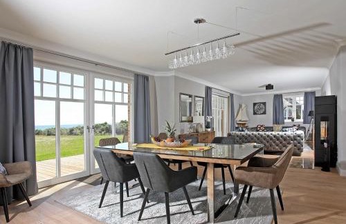 Lobbe Villa | Strandhaus 7 "Ostsee" in Lobbe mit Meerblick, Sauna, Kamin