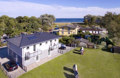 Gohren House | strandnah, Balkon, Meerblick, Sauna, gratis Nutzung vom AHOI Erlebnisbad und Sauna in Sellin - Beach House Palstek