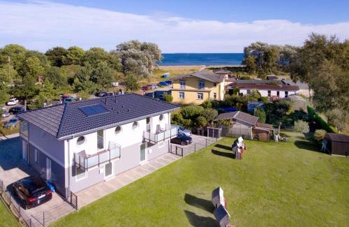 Gohren House | strandnah, Balkon, Meerblick, Sauna, gratis Nutzung vom AHOI Erlebnisbad und Sauna in Sellin - Beach House Palstek