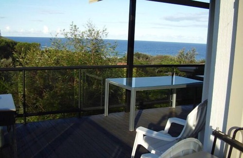 Port Macquarie Apartment | STRATHMORE LODGE UNIT 1. UPPER LEVEL. Spectacular views of Lighthouse Beach.
