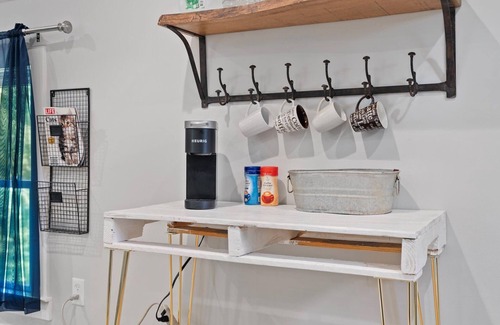 Matthews House | Studio above a detached garage away from main house on a private lot.