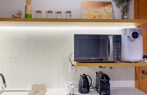 Asa Norte Apartment | Studio Aconchego portaria 24h, elevador e garagem