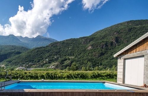 Talamona Apartment | Studio apartment 'Agriturismo L'isola Del Cavallo 4' with Mountain View, Shared Garden and Wi-Fi