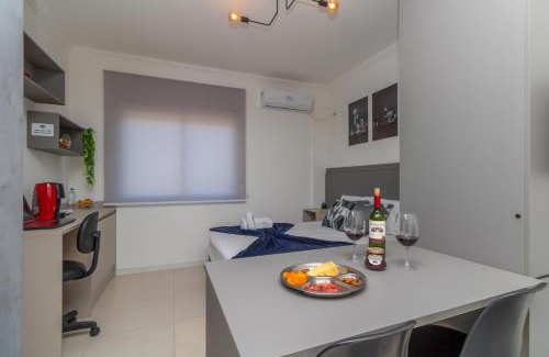 Centro Apartment | Studio delicinha Prox Atitus com Garagem