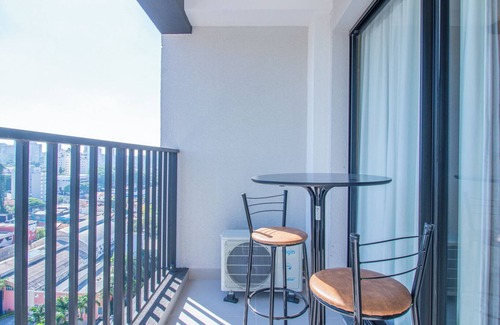 Santo Amaro Apartment | Studio elegante com varanda e ótima localização