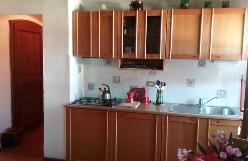 Massa Marittima Apartment | Studio with Balcony in an old town house, in a quiet and sunny