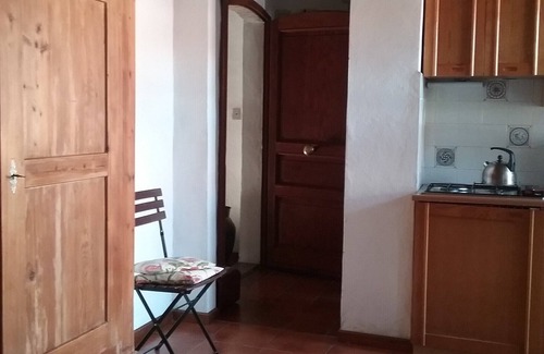 Massa Marittima Apartment | Studio with Balcony in an old town house, in a quiet and sunny