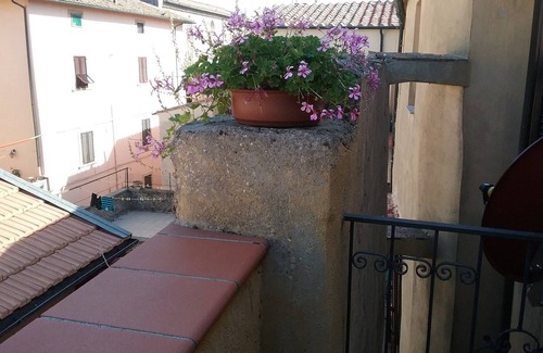 Massa Marittima Apartment | Studio with Balcony in an old town house, in a quiet and sunny