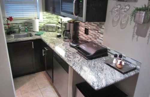 Lakeside Park Cabin | Studio with larger kitchenette, fireplace, and nearby attractions