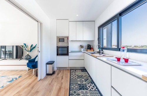 Olhos D'Agua Apartment | Stunning 3 BDR Flat W/Rooftop Pool by LovelyStay