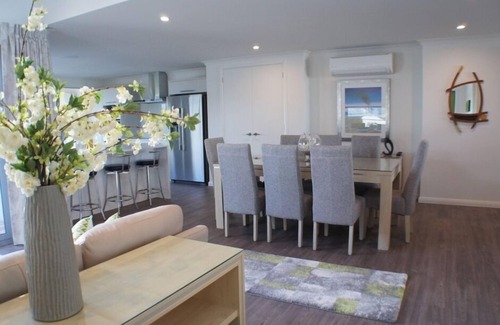 Matarangi House | Stunning modern harbour front beach house.