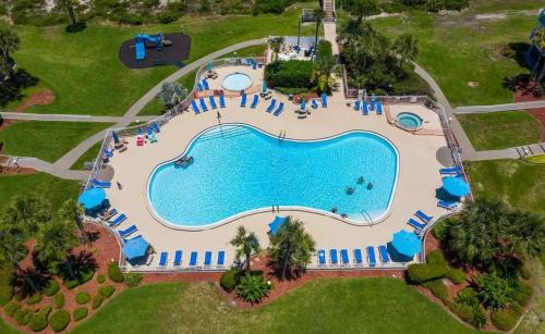 Butler Beach House | Stunning Ocean Views, Huge Patio, Heated Pool and Amenities!