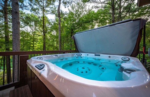 Broken Bow Cabin | Stunning oversized porch overlooking Pine Lake. Jacuzzi hot tub, outdoor see through fireplace!