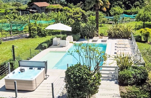 Besozzo Villa | Stunning private villa for 8 people with hot tub, private pool, WIFI, A/C, TV, patio and parking