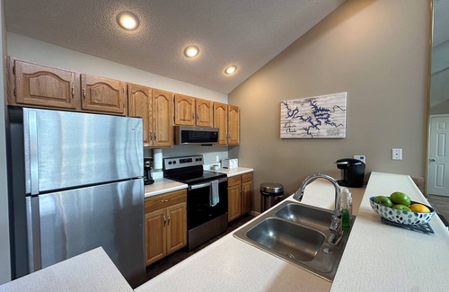 Osage Beach Condo | Stunning View at Pelican Bay! Near Margaritaville & Redheads. Boat & PWC Slips.