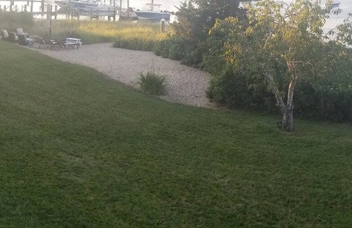 Hyannis House | Stunning waterfront with sandy beach & dock walking distance to top restaurants!
