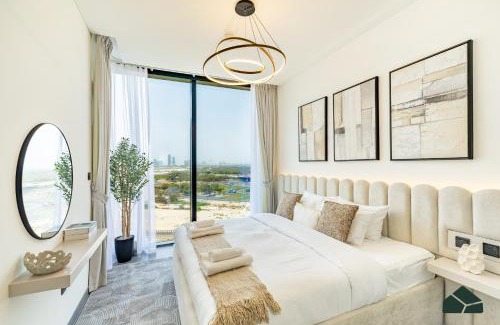 Nad Al Sheba Apartment | Stylish 1BR with City and Partial Burj View by BMS