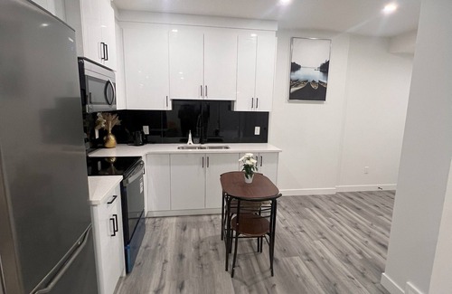 Southeast Calgary Apartment | Stylish Basement Suite w/Private Entry & Workspace