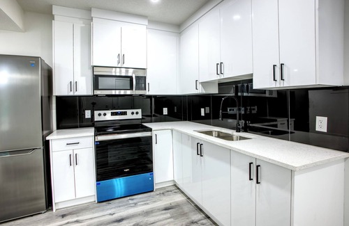 Southeast Calgary Apartment | Stylish Basement Suite w/Private Entry & Workspace