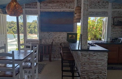 Itacare Ski Chalet | Stylish cabin with large deck overlooking Costa and Tiririca beaches.