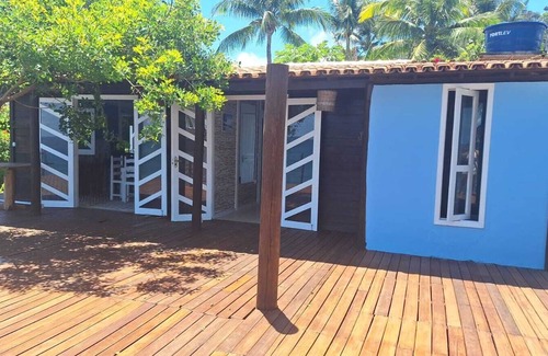 Itacare Ski Chalet | Stylish cabin with large deck overlooking Costa and Tiririca beaches.
