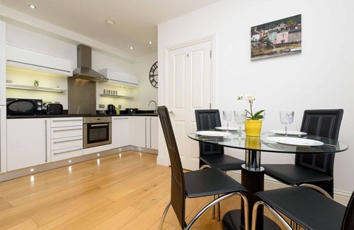 Looe House | Stylish first floor apartment in the heart of town with lovely river views.