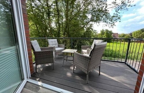 Westeraccumersiel Apartment | Stylish new-build top floor apartment with air conditioning and far-reaching views