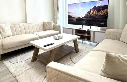 Nad Al Sheba Apartment | Stylish Pool View 1BR l Central Medyan Escape