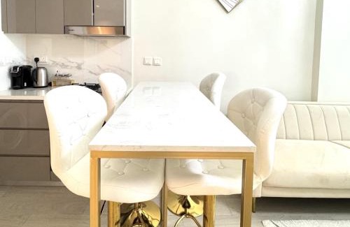 Nad Al Sheba Apartment | Stylish Pool View 1BR l Central Medyan Escape