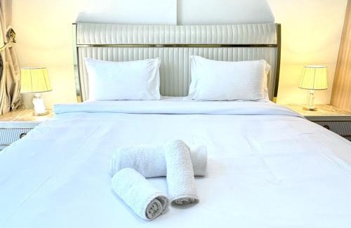 Nad Al Sheba Apartment | Stylish Pool View 1BR l Central Medyan Escape