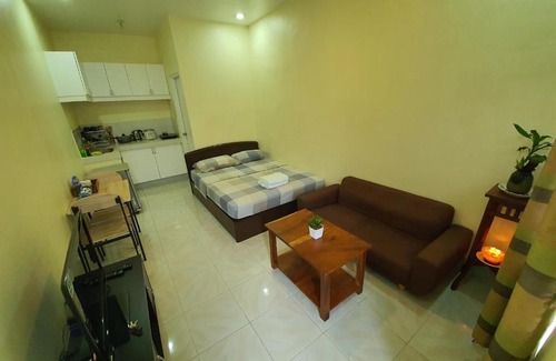 Balibago Apartment | STYLISH SECLUDED 4BR LODGE NEAR ENCHANTED KINGDOM + 2MIN WALK TO BALIBAGO COMPLEX