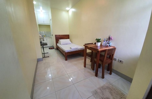 Balibago Apartment | STYLISH SECLUDED 4BR LODGE NEAR ENCHANTED KINGDOM + 2MIN WALK TO BALIBAGO COMPLEX