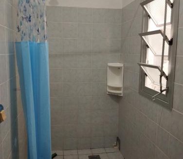 Penha Apartment | Suìte Madagascar