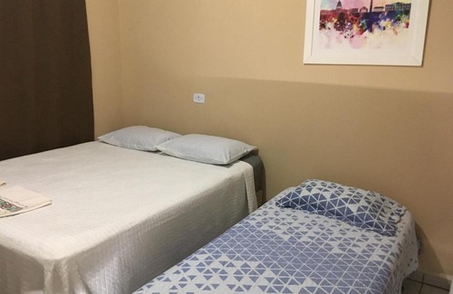 Mateiros House | SUÍTE 01 - com cozinha compartilhada