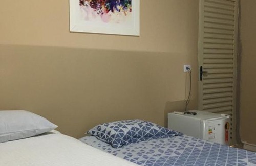 Mateiros House | SUÍTE 01 - com cozinha compartilhada