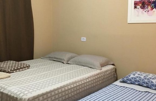 Mateiros House | SUÍTE 01 - com cozinha compartilhada