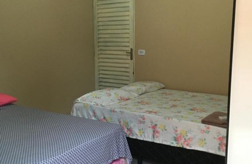 Mateiros Apartment | SUÍTE 02 - com cozinha compartilhada