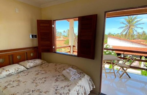 Guajiru House | Suíte das flores em Guajiru