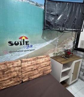 Guarapari Apartment | Suíte Mar 210 - Econômica e Compacta - Praia do Morro - Prédio frente Mar com elevador, atravessou a avenida, já está na Praia - Garagem - Internet