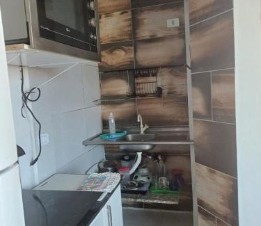 Praia de Leste Apartment | Suíte Praia leste 02