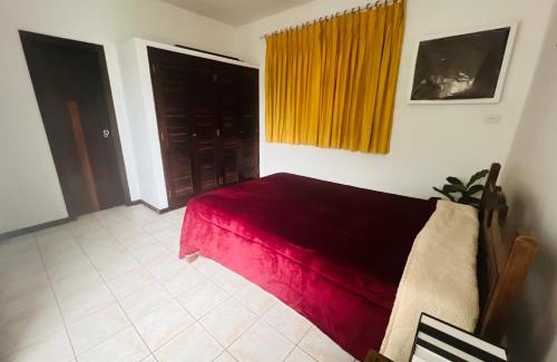 Enseada House | Suíte suspensa Guarujá