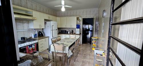 Socorro House | Suítes em rua principal de Socorro-SP